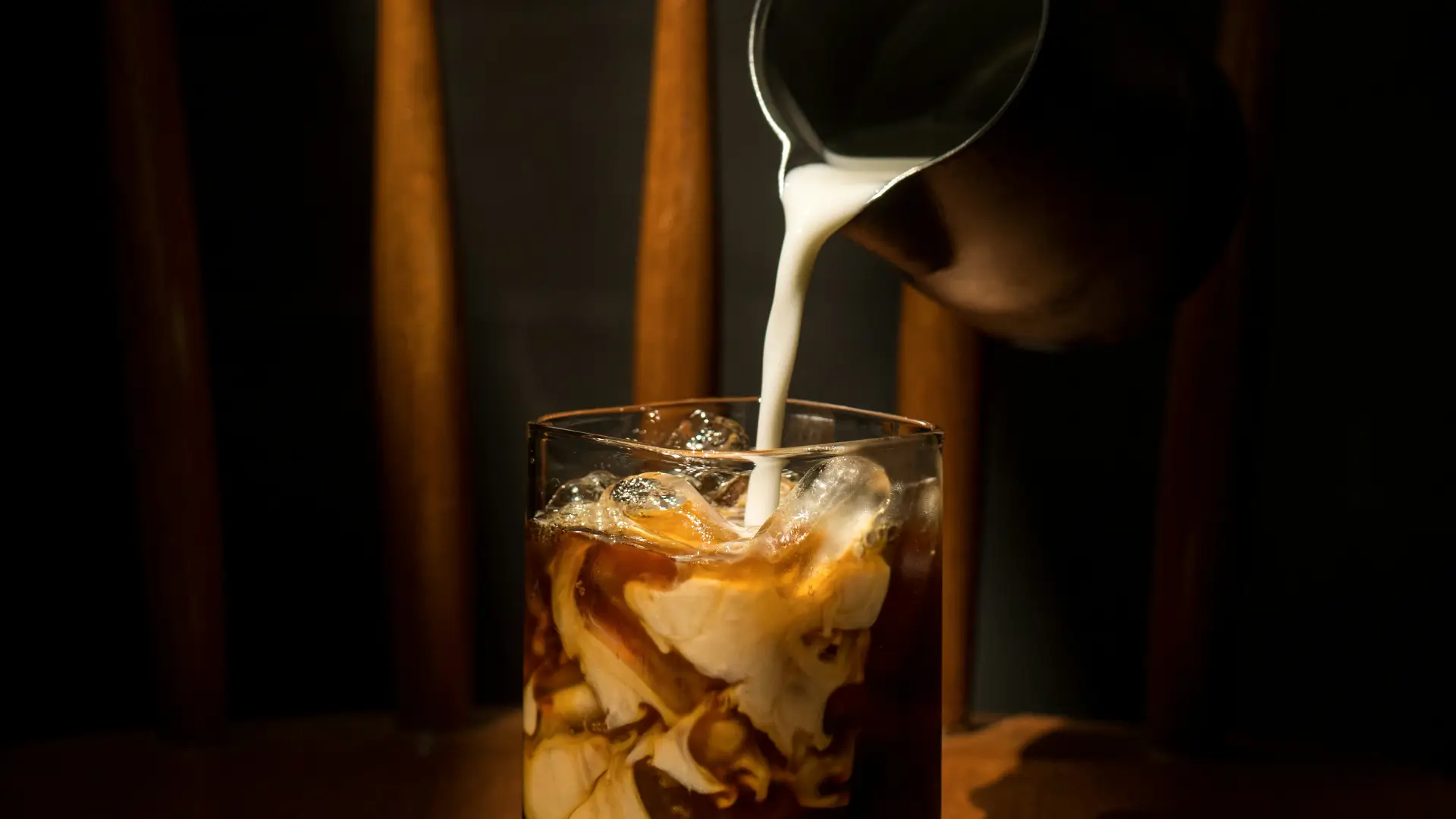 milky drink being poured