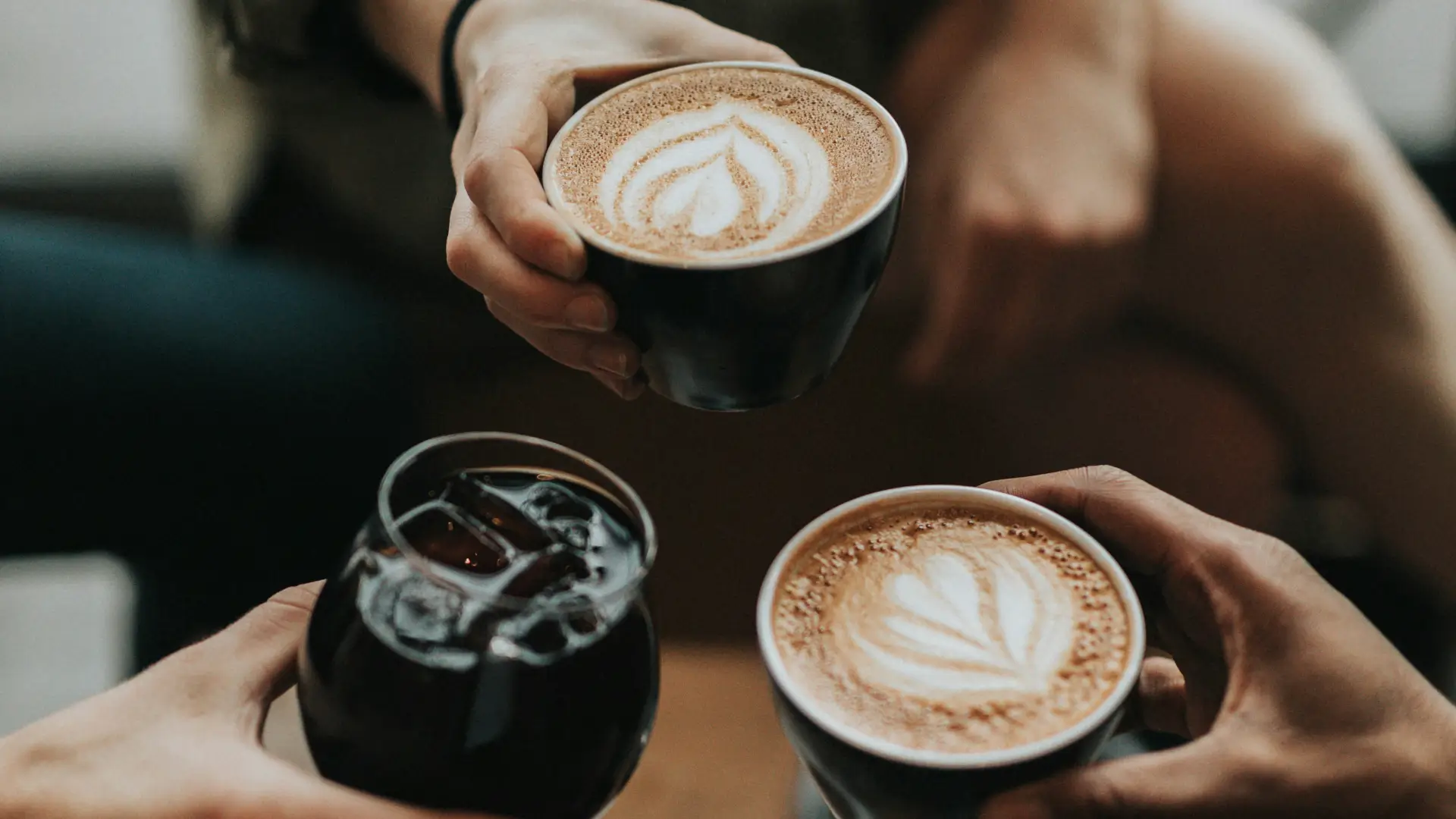 three friends with drinks