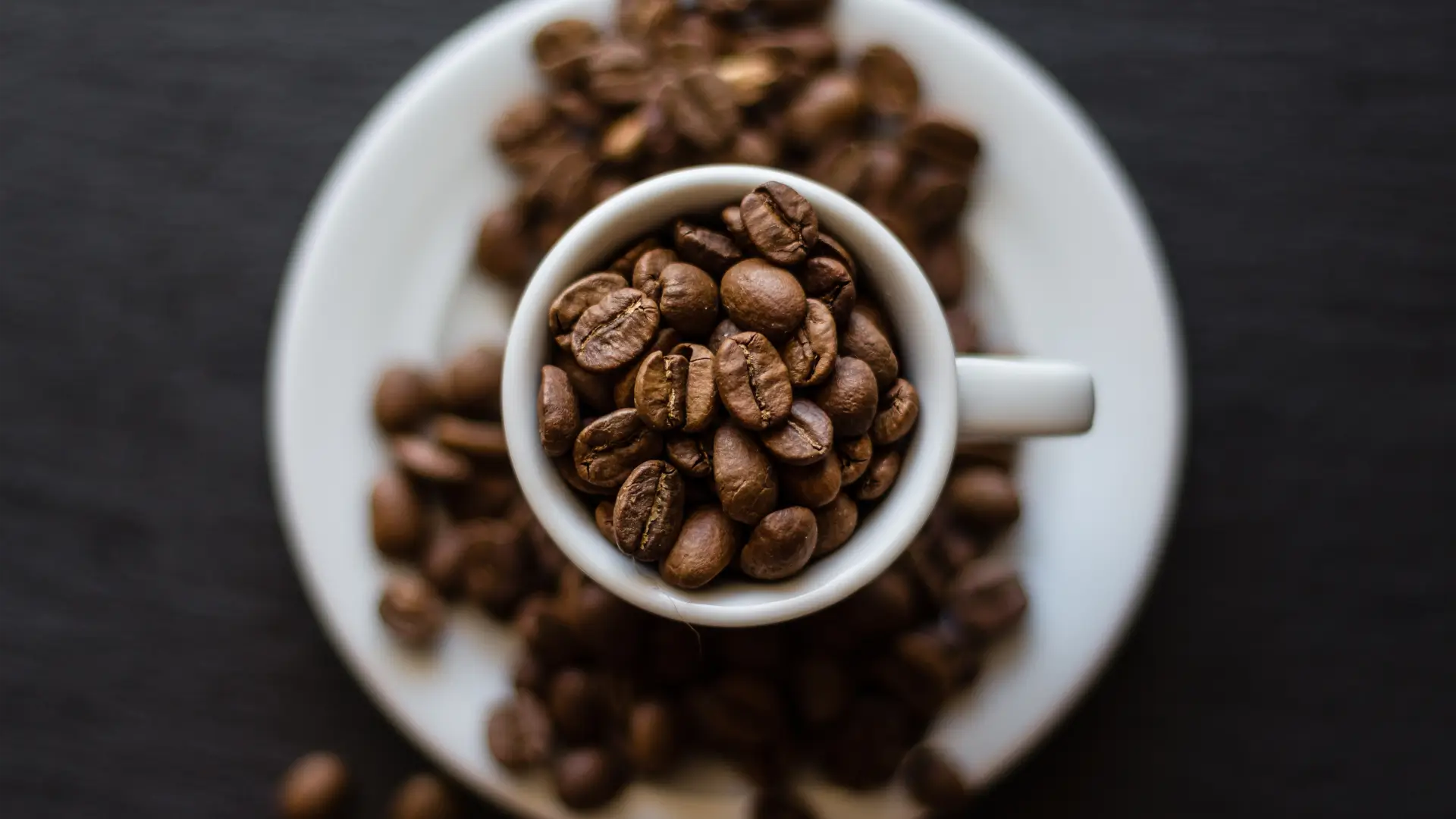 epsresso cup with coffee beans