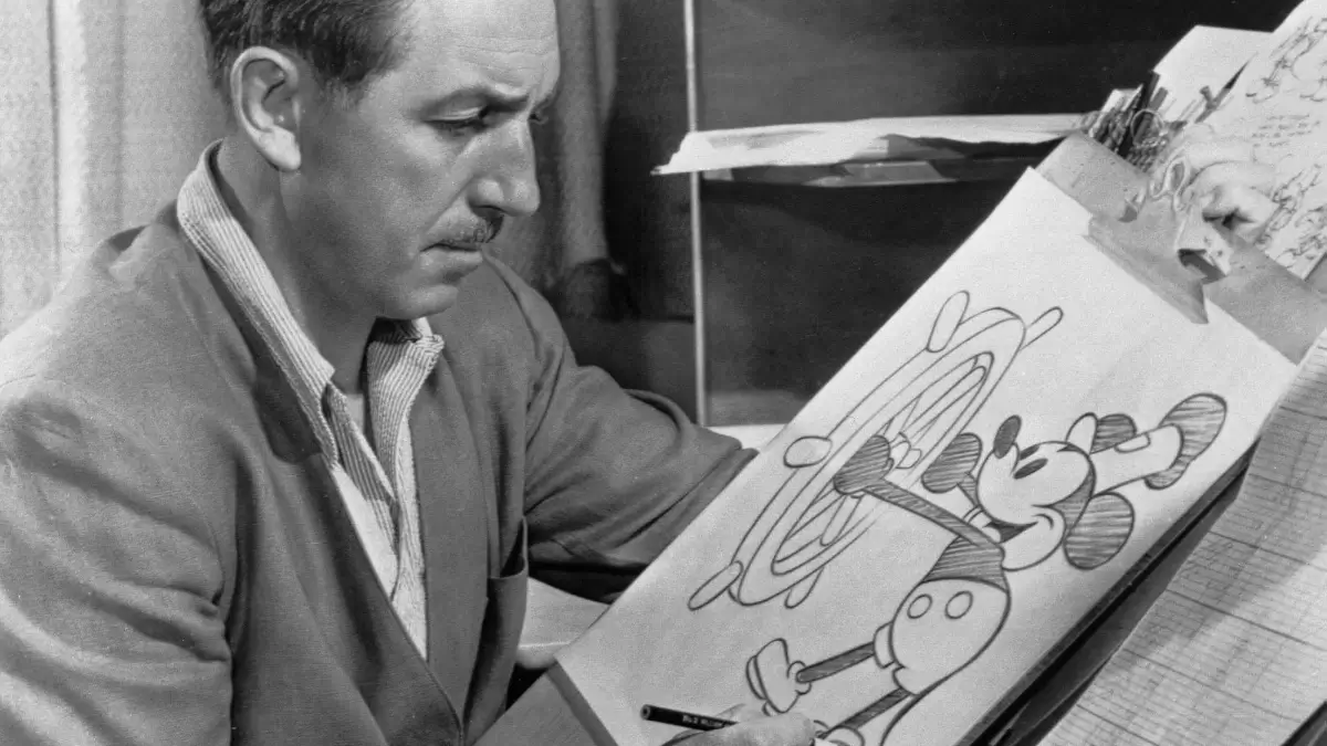 walter disney surrounded by mickey plushies