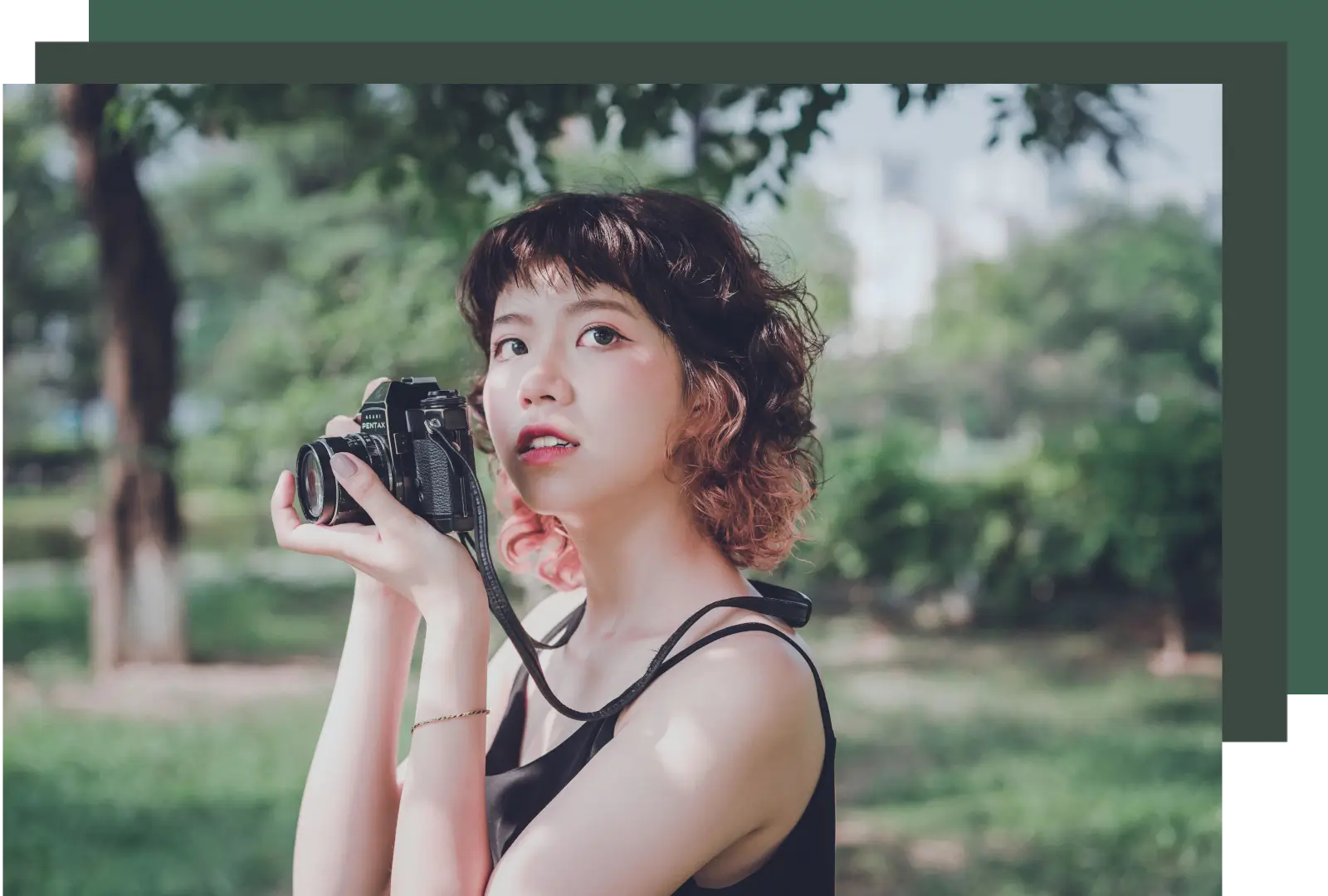 girl holding photography camera