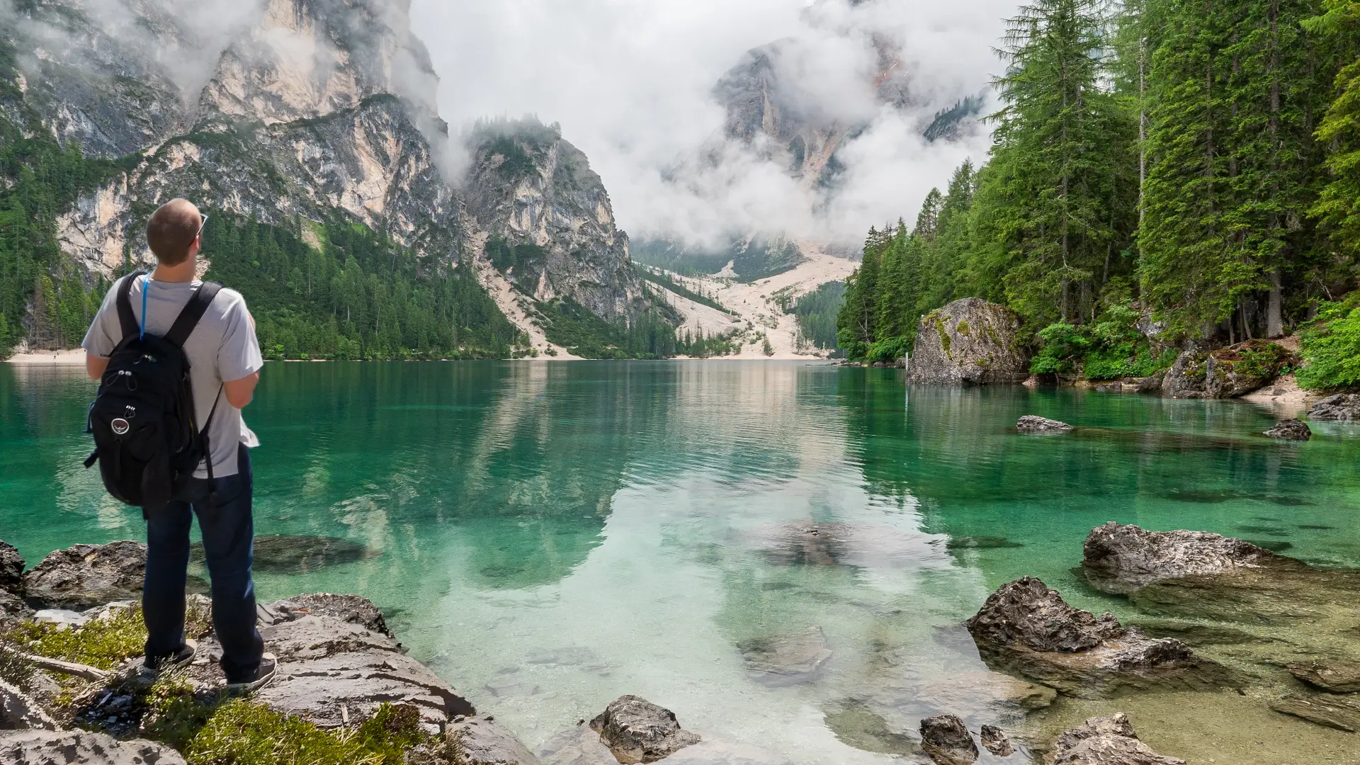 guy in a scenic view of lake
