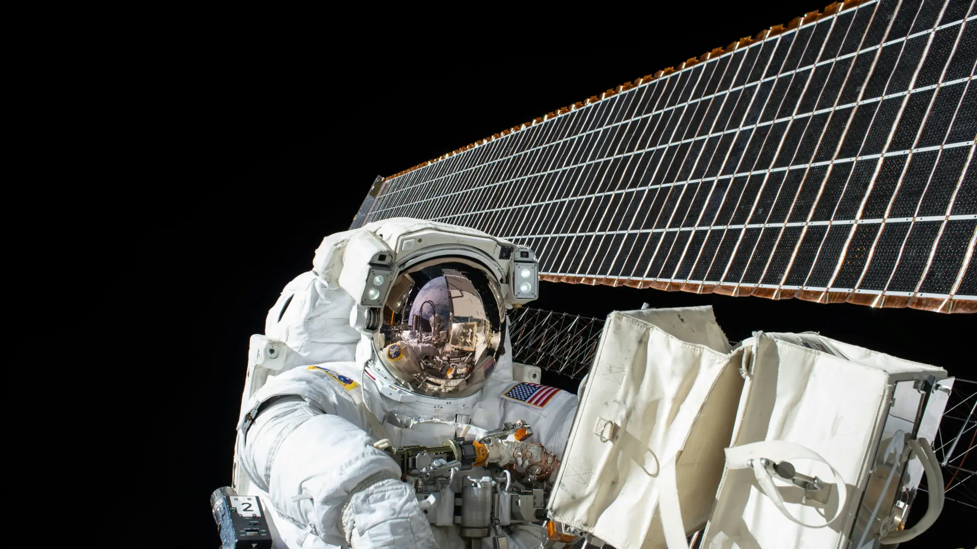astronaut with a satellite